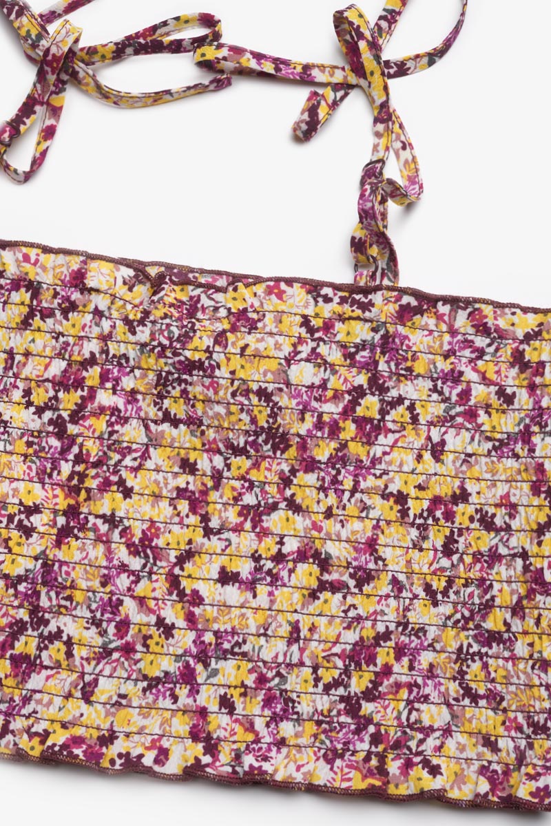 Kurzes Top Janisgi mit rosa und gelbem Blumenmuster.