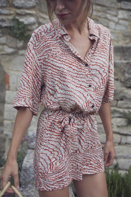 Jumpsuit Zely mit orange-schwarzem Muster