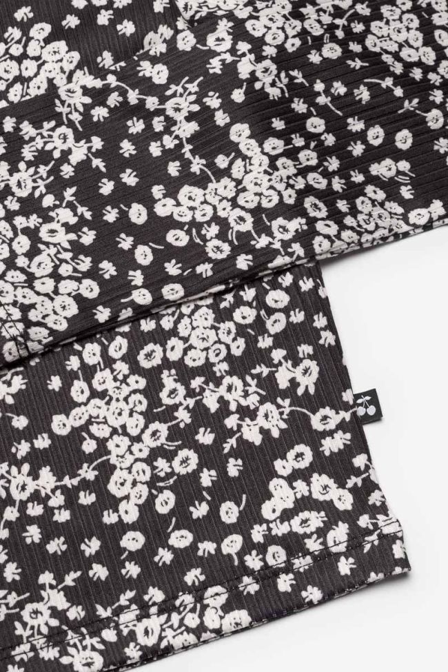 Strickjacke Comegi mit Blumenmuster in Schwarz und Weiß
